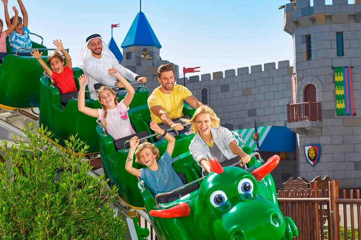 Experience the joyous laughter and excited screams as families enjoy exhilarating rides surrounded by whimsical attractions and charming castle scenery at Motiongate and Legoland Dubai.